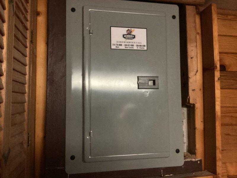 Completed comprehensive electrical safety inspection for member as part of preventative maintenance program. Inspected main electrical panel in utility area, verifying proper installation, labeling, and secure mounting between wall studs. Evaluated kitchen electrical outlets and connections, noting multiple appliances in use on backsplash receptacle. Documented all findings with photographs for service records. No immediate repairs required at time of inspection.