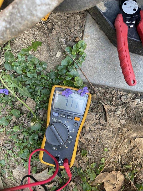 Completed comprehensive cooling system tune-up on 2016 AC unit in response to reported rattling noise from top portion of condenser. Performed electrical diagnostics using multimeter to verify proper voltage and amperage readings, inspected blower wheel assembly for debris and balance issues, and examined all mounting hardware and panels for loose components causing vibration. Unit operational with all readings within manufacturer specifications; secured top panel fasteners to eliminate rattling condition.