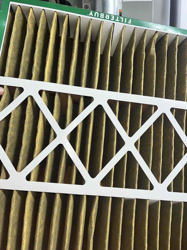 Performed comprehensive cooling season tune-up on 8-year-old residential air conditioning unit. Inspected and photographed blower wheel assembly, noting moderate dust accumulation on squirrel cage blower and housing components; verified motor shaft coupling and hardware secure. Evaluated air filtration system, confirmed proper installation of clean pleated media filter in crosshatch frame. Completed standard maintenance protocols including system performance verification and operational testing of all cooling components.