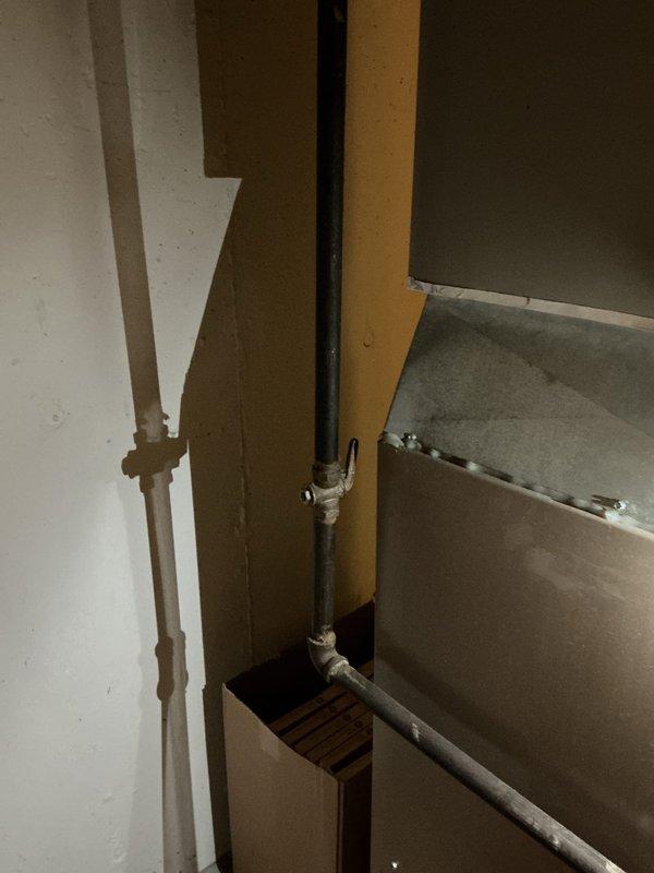 Completed furnace gas line service call to upgrade shut-off valve and install required drip leg on 10-year-old basement unit. Replaced existing gas valve with code-compliant shut-off valve and added sediment trap (drip leg) to gas supply line per safety standards to protect gas valve and burner assembly from debris and moisture in gas line.