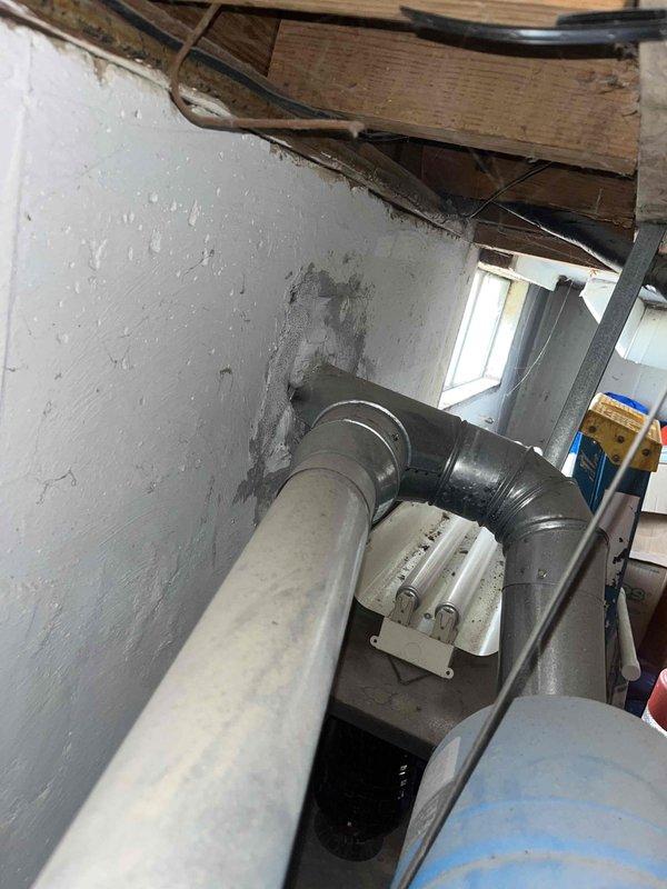 Responded to no cooling complaint on 10+ year old residential AC system located at rear of property. Upon arrival, performed diagnostic evaluation of outdoor condenser unit and indoor air handler system. Inspected condenser unit for proper operation, verified electrical connections, checked refrigerant lines, and assessed overall system performance to identify root cause of cooling failure and restore proper operation.