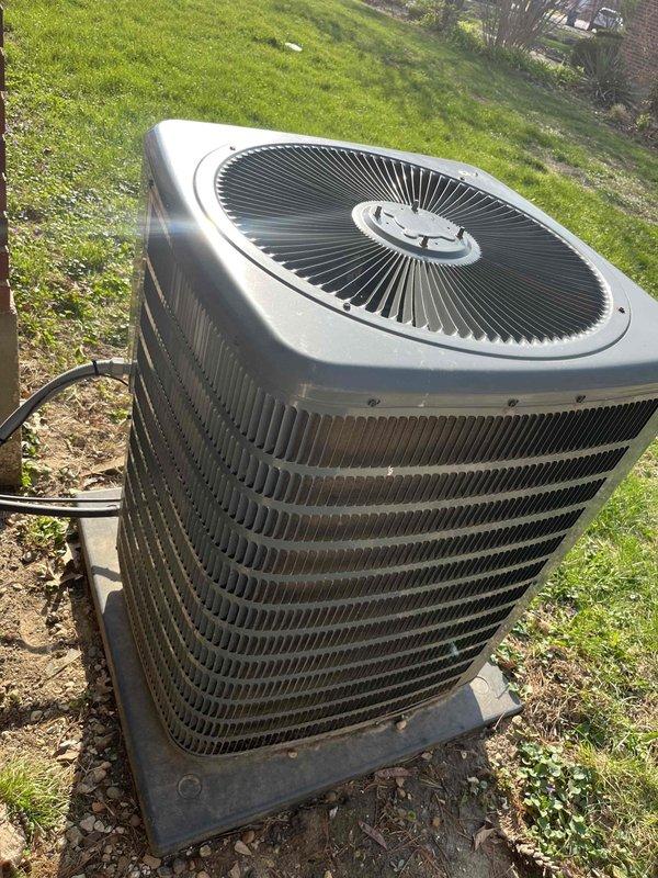 Responded to no cooling complaint on 10+ year old residential AC system located at rear of property. Upon arrival, performed diagnostic evaluation of outdoor condenser unit and indoor air handler system. Inspected condenser unit for proper operation, verified electrical connections, checked refrigerant lines, and assessed overall system performance to identify root cause of cooling failure and restore proper operation.