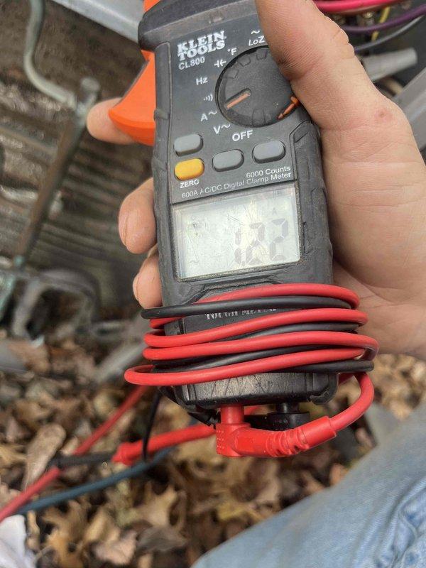 Completed comprehensive super tune maintenance on two HVAC systems, both exceeding 25 years of age. Performed full system diagnostics on furnace located in basement and air conditioning unit in side yard area, including electrical testing with digital clamp meter to verify proper amperage draw and system performance. Inspected Carrier condensing unit model CCCLC048A/GD00, confirmed all manufacturer specifications, and documented equipment condition with photographic records for customer files.