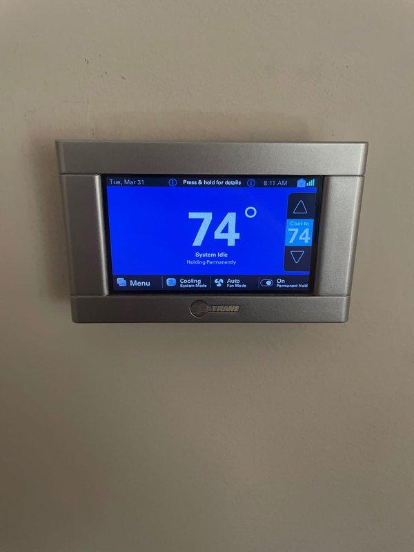 Completed comprehensive cooling tune-up on 4-year-old ground-level AC unit during morning service window. Performed full system inspection including control board evaluation, thermostat functionality verification showing system idle at 74°F setpoint, and electrical connections assessment. All components found operating within normal parameters with no deficiencies noted; system ready for cooling season operation.