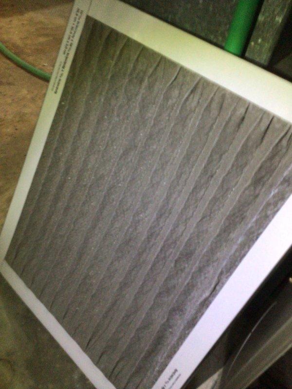 Completed cooling tune-up on 13-year-old outdoor unit, performing standard maintenance procedures including system inspection, temperature verification at thermostat reading 78°F, and filter assessment. Observed heavily soiled air filter with significant dust and debris accumulation, which was documented for replacement recommendation to ensure optimal airflow and system efficiency.