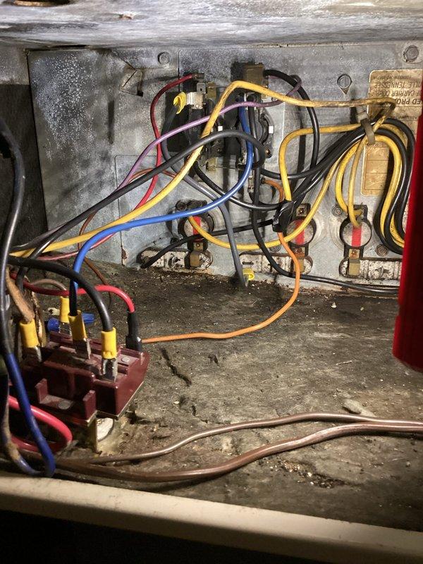 Completed electrical wiring repair on HVAC unit requiring replacement of spade connectors and installation of 10 inches of 8-10 gauge wire. Materials were provided and connections were properly secured to restore system functionality.