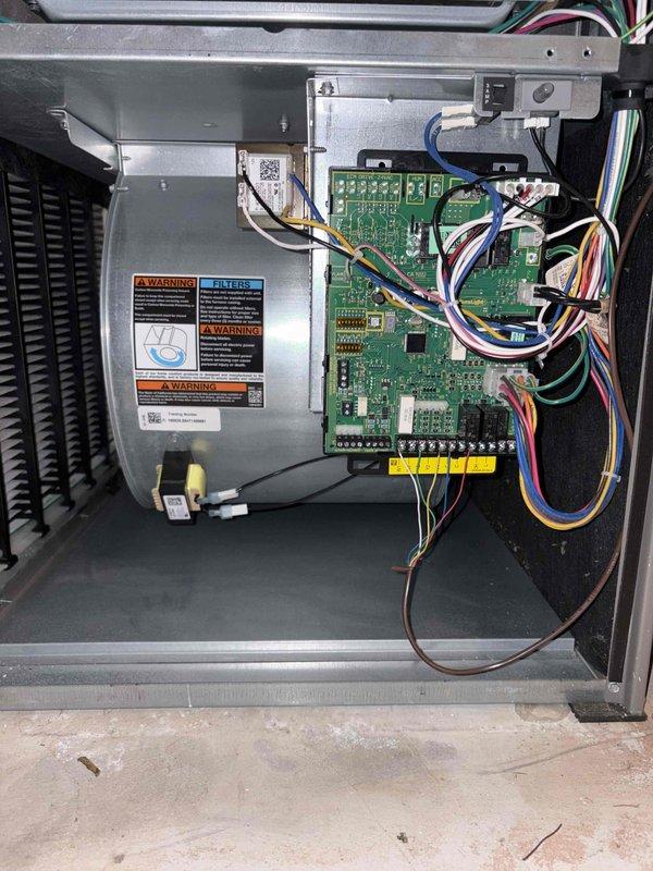 Completed cooling maintenance tune-up on residential HVAC system. Inspected control board, blower motor assembly, and evaporator coil; verified all electronic components, wiring connections, and heat exchanger fins were clean and functioning properly. System operational with no deficiencies noted at time of service.