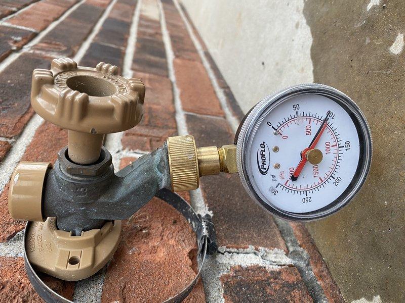 Replaced 20-year-old gas water heater with new 50-gallon gas tall unit in basement. Installed 3/4-inch pressure reducing valve (PRV) with gauge assembly on incoming water supply line, reading within normal operating range. Completed installation per permit #26PLU-05910 with required plumbing identification sticker affixed, ensuring all gas connections, water supply lines, temperature and pressure relief valve, and venting met code requirements.