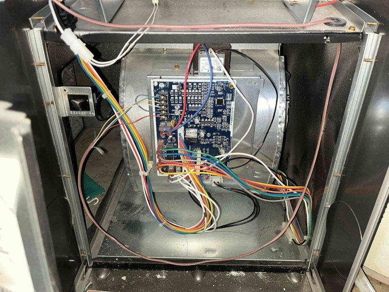 Completed comprehensive cooling system tune-up on single outdoor AC unit. Performed standard maintenance protocol including inspection of control board and electrical connections within air handler compartment, verified proper wiring integrity and circuit board functionality. Replaced dirty air filter with new unit, as evidenced by significant discoloration and debris accumulation on existing filter media. All system components operating within normal parameters upon completion of service.