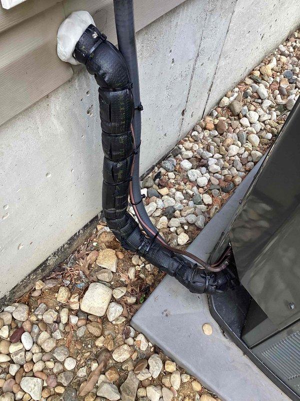 Responded to callback for kinked suction line repair on residential HVAC system. Located and assessed damaged suction line section that was restricting refrigerant flow. Straightened kinked portion of suction line and verified proper refrigerant flow restoration. Connected digital manifold gauges to system and performed comprehensive pressure and temperature diagnostics across all measurement points. Verified proper superheat readings and confirmed system pressures returned to manufacturer specifications. Inspected condensate drainage system and confirmed proper operation with no blockages. System tested in cooling mode with all parameters within normal operating range. Unit left operating efficiently with restored refrigerant flow and proper system performance.