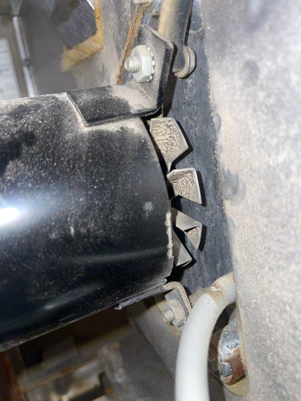 Responded to heating complaint affecting multiple rooms on lower level of residence. Upon inspection of 16-year-old Lennox furnace system, discovered significant crack in condensate drain hose causing system safety shutdown. The damaged black rubber drain line exhibited extensive splitting and material deterioration due to age and brittleness. Replaced failed condensate drain hose with new component, secured all connections, and verified proper drainage. Tested system operation across all zones to confirm restored heating functionality throughout affected areas. System now operating within normal parameters with all rooms receiving adequate heat distribution.