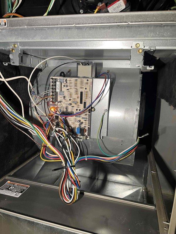 Completed comprehensive cooling season tune-up on 10-year-old basement HVAC unit. Performed full system inspection including control board examination, verified all electrical connections and wiring harnesses, checked capacitor operation, inspected air filter condition (Glasfloss media filter in place), examined refrigerant lines and copper piping for proper insulation and connections, and confirmed all mechanical components operating within normal parameters. System tested and left in proper working condition for cooling season.