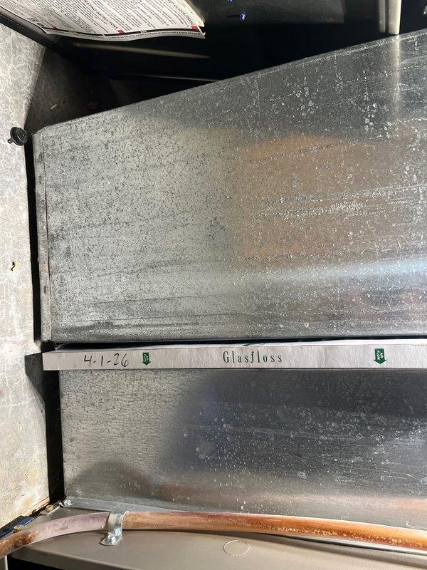 Completed comprehensive cooling season tune-up on 10-year-old basement HVAC unit. Performed full system inspection including control board examination, verified all electrical connections and wiring harnesses, checked capacitor operation, inspected air filter condition (Glasfloss media filter in place), examined refrigerant lines and copper piping for proper insulation and connections, and confirmed all mechanical components operating within normal parameters. System tested and left in proper working condition for cooling season.
