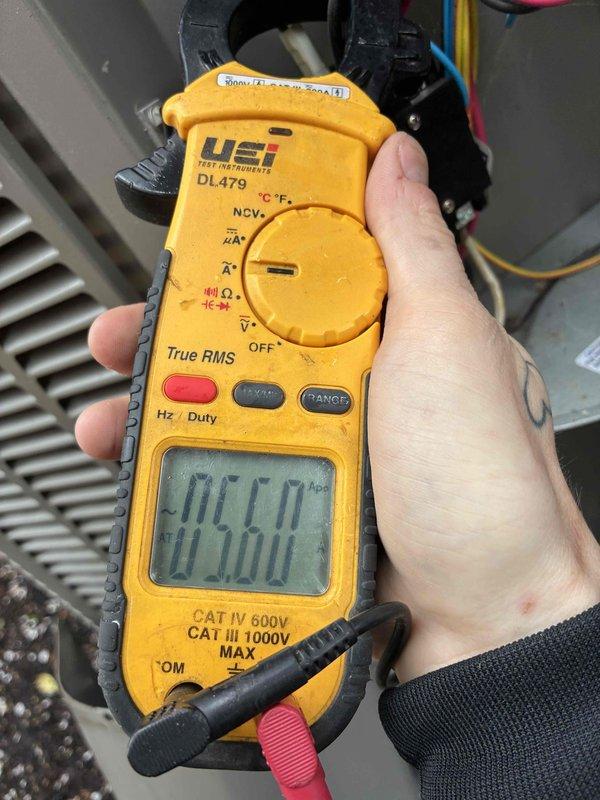 Completed cooling tune-up on 9-year-old attic-mounted air conditioning system. Performed comprehensive inspection of blower motor assembly, verified electrical connections and capacitor operation, checked evaporator coil condition, and measured system temperatures and voltages using diagnostic equipment. All components found operating within normal parameters with no deficiencies noted.