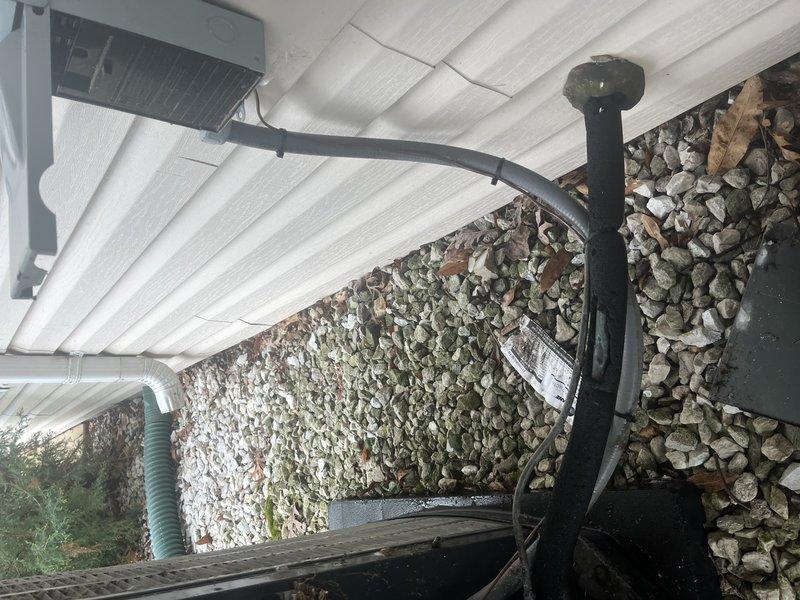 Responded to no-cooling call on 10+ year old outdoor unit. Upon arrival, found significant accumulation of leaves, twigs, and organic debris in electrical compartment surrounding wire connections. Removed all debris from electrical box and wire bundles, cleaned contaminated connections, and verified proper electrical continuity. Unit tested successfully after debris removal, with cooling system operating within normal parameters.