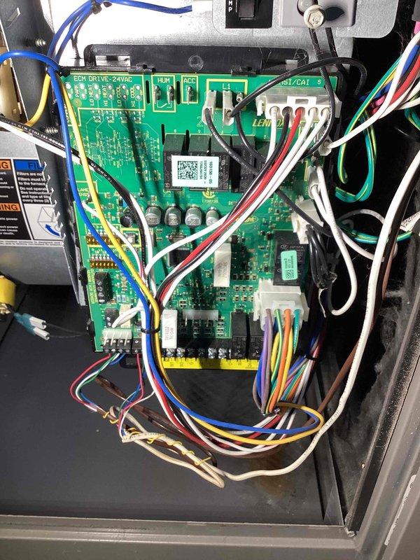 Responded to service call for thermostat displaying error code 207 on HVAC unit located in dining room (under 10 years old). Accessed control panel and inspected main circuit board, wire connections, and electrical components. Found loose wire connection at terminal block causing communication fault. Secured all wire connections, verified proper voltage at 24VAC terminals, and cleared error code. Tested system operation through full heating and cooling cycles to confirm proper functionality and successful resolution of service alert.
