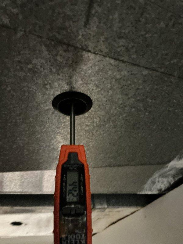 Completed comprehensive tune-up and maintenance service on residential HVAC system per Home Depot work order F58176315. Performed system diagnostics and operational testing, confirming unit functionality with digital measurement instrumentation. Inspected and verified proper air filter installation, noting pleated media filter properly seated in overhead air handler mounting frame with adequate insulation integrity in attic-mounted equipment area.