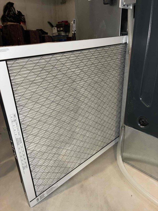 Completed comprehensive cooling season tune-up on 4-year-old residential air conditioning system located in basement. Performed full system inspection including blower motor assembly and squirrel cage fan evaluation, verified proper operation of all electrical connections and wiring, inspected and documented air filter condition, checked blower wheel for dust accumulation and proper rotation, and confirmed all components operating within manufacturer specifications.