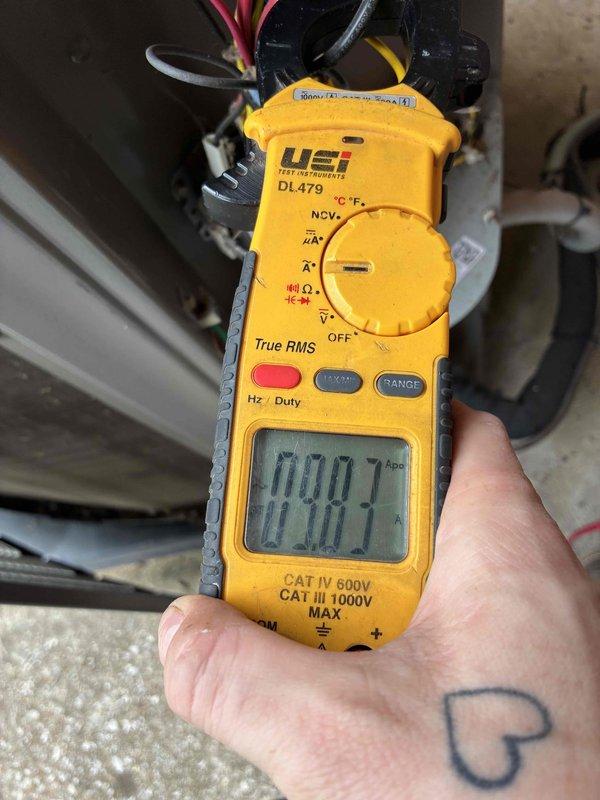 # HVAC Cooling System Tune-Up Completed

Performed comprehensive preventive maintenance tune-up on a 7-year-old residential air conditioning unit located in the backyard. Conducted complete system inspection and diagnostics using calibrated digital multimeter to verify electrical performance and component functionality. Measured capacitance readings on compressor and condenser fan motor capacitors to ensure proper operation within manufacturer specifications. Checked amperage draw on electrical components to confirm system is operating efficiently without excessive current consumption. All electrical connections were inspected and tested for proper voltage and continuity. System components were evaluated for wear and operational efficiency. Unit is functioning properly and ready for cooling season operation. Photographic documentation of diagnostic testing procedures was completed for service records.