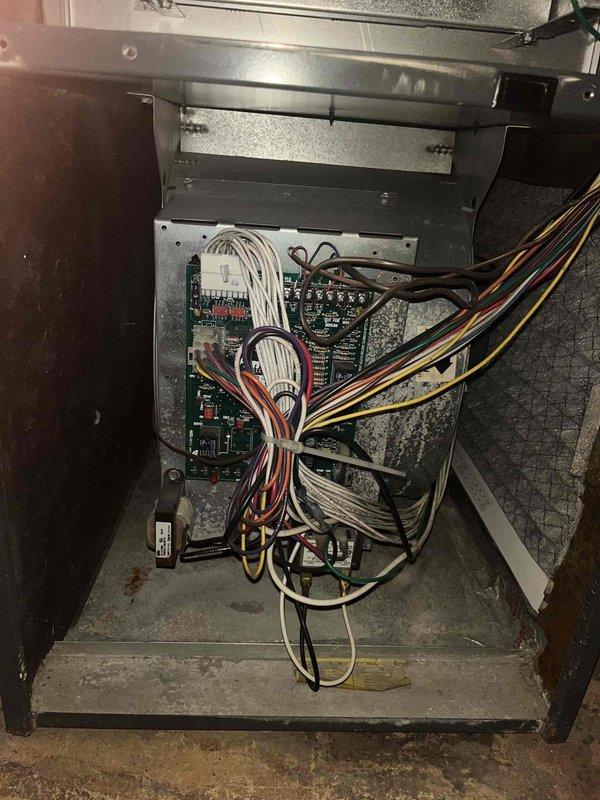 Completed cooling system tune-up on a single residential unit under 10 years old. Performed comprehensive inspection of control board wiring and electrical connections within the cabinet, confirming all circuits and components functioning properly. Documented heavily contaminated air filter with significant dust and debris accumulation; filter requires replacement to maintain proper airflow and system efficiency.