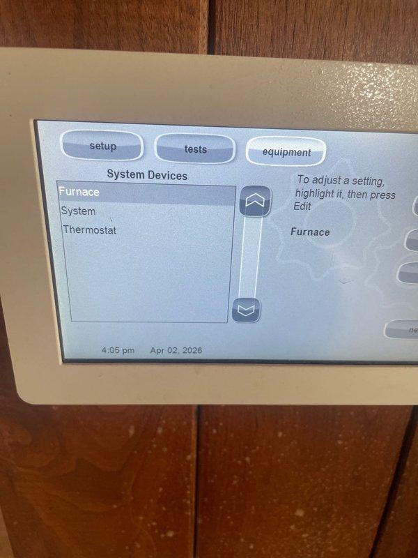 Responded to service call for malfunctioning thermostat on 12-year-old HVAC system. Accessed thermostat equipment settings menu and inspected control board wiring connections at furnace, verifying proper terminal connections for heating and cooling circuits. Documented system configuration and control board condition for diagnostic purposes.