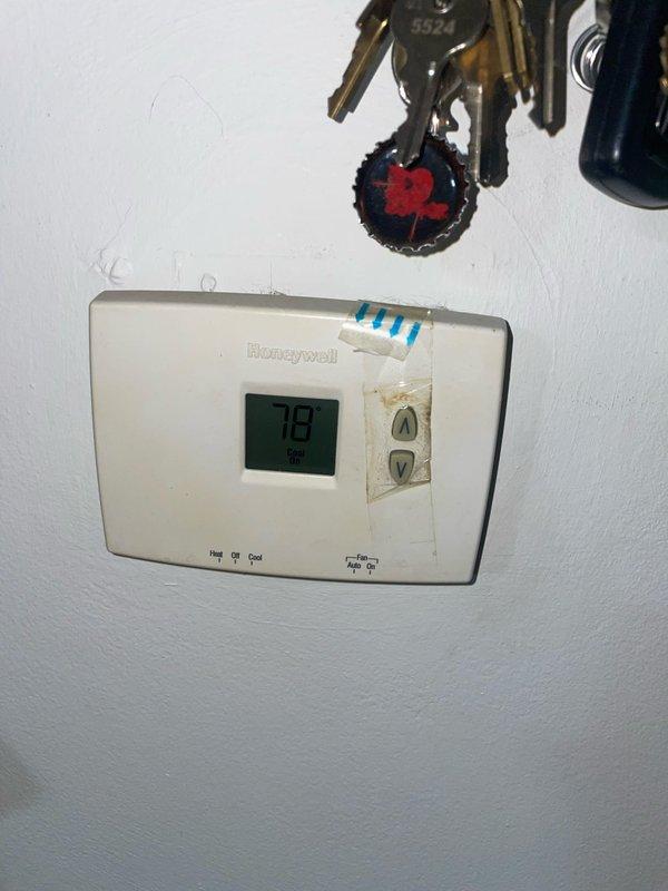 Responded to no cooling call on 10+ year old air conditioning system. Upon arrival, found thermostat set to cool mode at 78°F but unit producing only ambient air with no temperature drop. Performed diagnostic evaluation of system components including thermostat functionality and electrical connections at air handler terminal block. Inspected wiring integrity and terminal connections, noting age-related deterioration of equipment. Identified root cause of cooling failure and completed necessary repairs to restore proper system operation. Unit tested and verified cooling cycle functioning correctly upon departure.