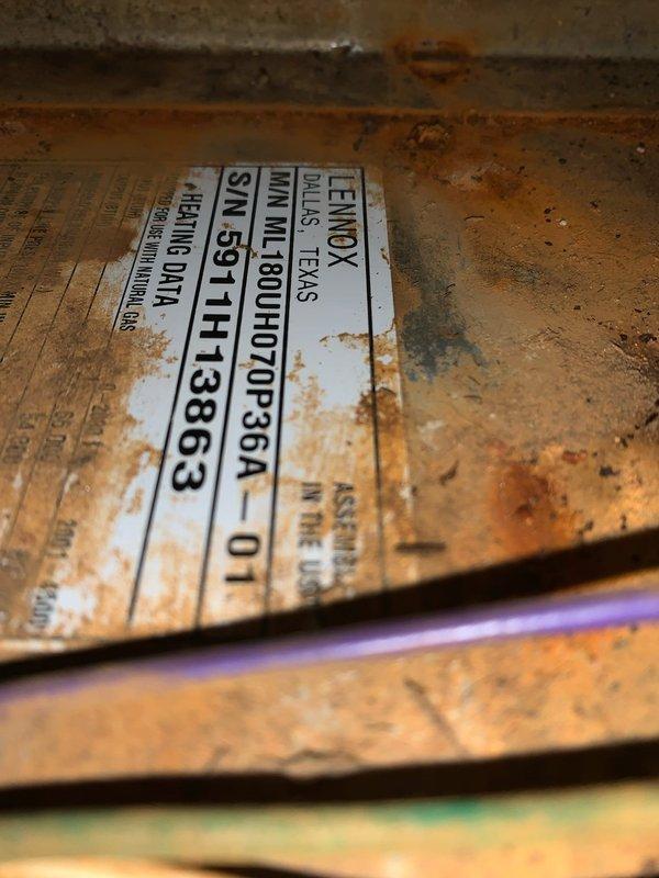 Completed cooling tune-up on Lennox outdoor unit (Model M1800HD70C36A) located in backyard. Performed comprehensive system inspection including electrical connections, refrigerant levels, condenser coil cleaning, and control board functionality verification. Unit operational with no major issues identified; noted exterior cabinet showing age-related corrosion consistent with 10+ year service life.