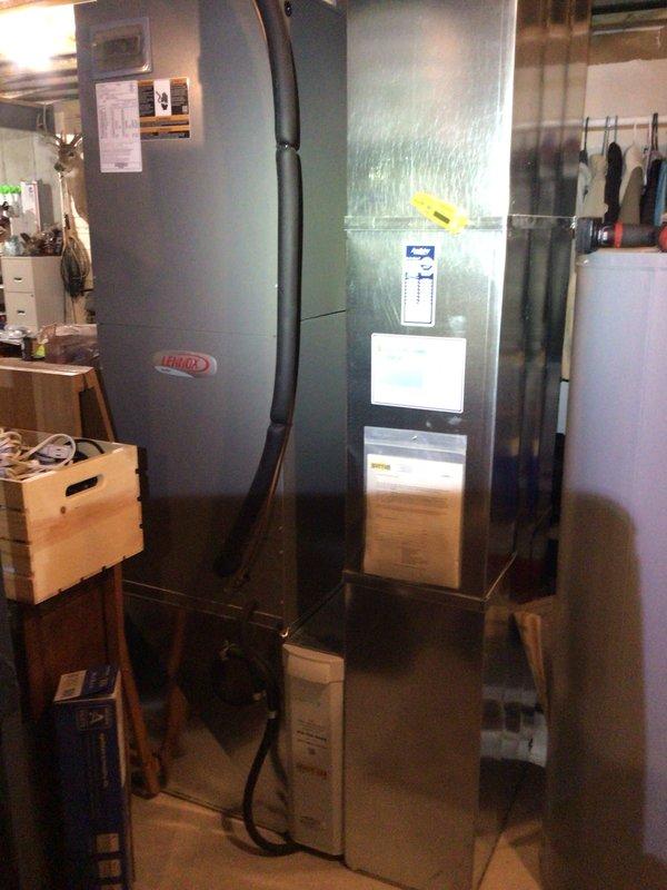 Completed comprehensive Supertune maintenance on 2021 Lennox HVAC system located in basement. Performed full inspection of furnace and air conditioning unit, verified proper operation of all components, inspected and confirmed clean pleated air filter in place, checked ductwork connections, and documented equipment condition with photos. System operating within normal parameters with no issues identified.