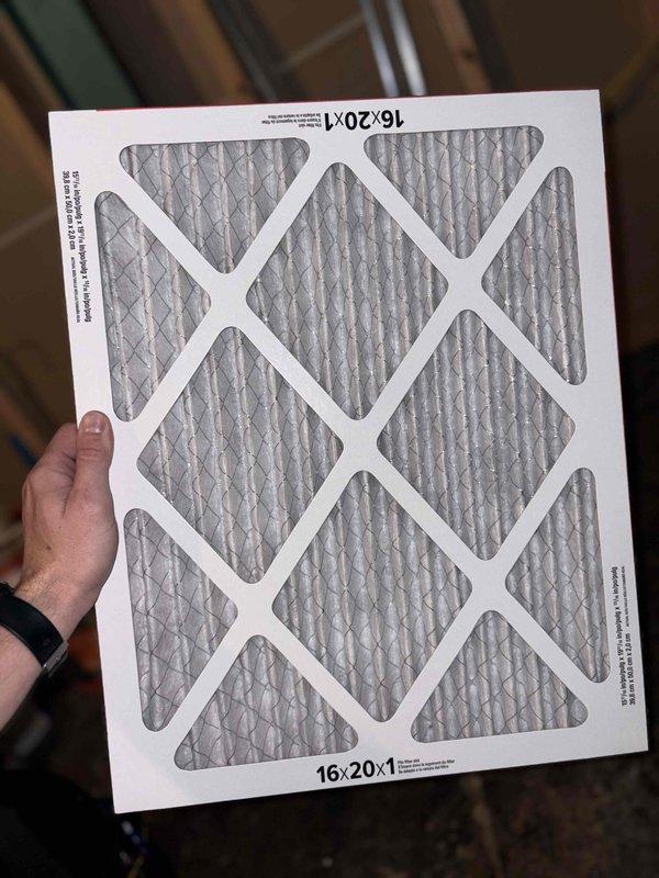 Completed cooling system tune-up on 4-year-old air conditioning unit. Inspected outdoor condenser coil fins which were found in good condition with proper spacing and no visible damage or debris accumulation. Replaced 16x20x1 pleated air filter to ensure optimal airflow and system efficiency.