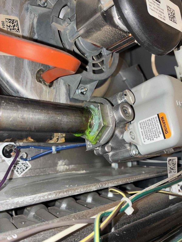 Responded to reported gas leak at 5-year-old furnace where gas utility had shut off supply valve as safety precaution. Upon arrival, performed comprehensive inspection of gas train components and identified corroded union connection at gas valve inlet showing visible green oxidation and deterioration. Conducted leak detection testing which confirmed active gas leak at the compromised union fitting. Replaced defective union connection, pressure tested entire gas line assembly to manufacturer specifications, and verified all connections were secure with no detectable leaks. Restored gas supply and performed complete system startup, confirming proper ignition sequence, burner operation, and flame characteristics within normal parameters.