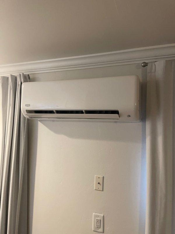 Responded to service call for ductless mini-split air conditioning system experiencing cooling issues. Performed diagnostic evaluation of 9-year-old unit, verified system operation, and confirmed thermostat functionality with remote control set to cooling mode at 74°F setpoint. System tested and operating within normal parameters upon completion of service visit.