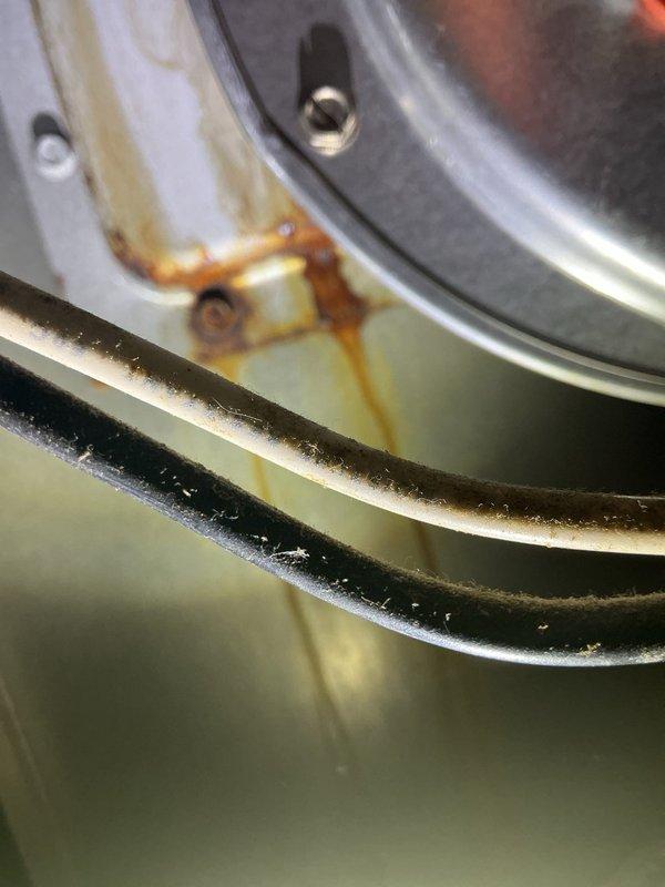 Performed heat exchanger inspection on 30-year-old furnace unit as requested. Visual examination revealed significant rust staining and corrosion on heat exchanger surfaces, with visible water damage patterns indicating potential metal deterioration. Documented findings with photographic evidence of affected components for review and recommended evaluation for replacement due to age and condition of unit.