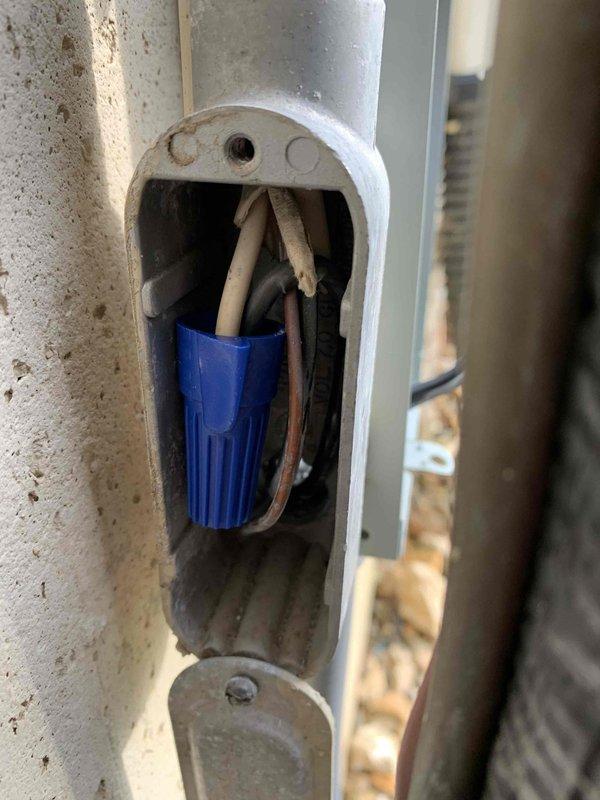 Responded to callback for HVAC panel tripping and air conditioning system malfunction. Upon inspection, discovered failed fuse holder with significant heat damage and corrosion in the outdoor unit's electrical junction box. Removed damaged fuse holder component, verified electrical connections, and restored proper operation to the cooling system.
