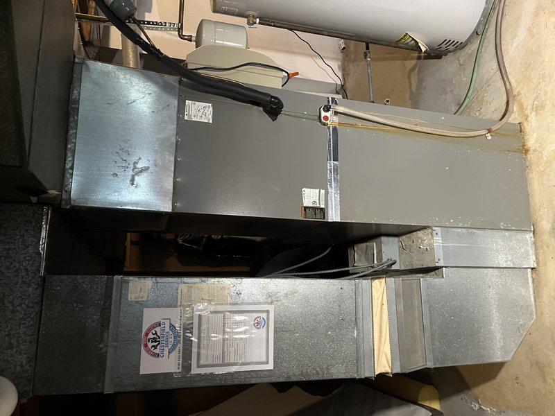 Responded to no heat/no cooling call for residential HVAC system. Upon arrival, found both furnace and air conditioning condenser unit non-operational. Performed diagnostic evaluation of basement-mounted furnace and air handler configuration, as well as exterior condensing unit. Identified electrical supply issue preventing system startup. Restored power to equipment, verified proper operation of all components including blower motor, gas valve, and condenser fan. System tested and returned to normal heating and cooling operation with all safety controls functioning correctly.