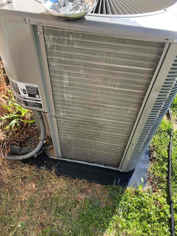 Completed comprehensive cooling season tune-up on 3-year-old outdoor condensing unit. Performed system diagnostics including electrical measurements with multimeter, inspected condenser coil fins and fan assembly, and verified proper operation of all components. Unit found to be operating within normal parameters with no deficiencies noted.