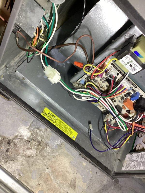 Responded to customer complaint of mildew odor from AC system upon seasonal startup. Performed inspection of 2-year-old Lennox unit and identified dust and debris accumulation on evaporator coil assembly. Cleaned evaporator coil fins, verified refrigerant line connections, and inspected electrical components and control board for proper operation. System tested successfully with no odor detected after cleaning, all components functioning within normal parameters.