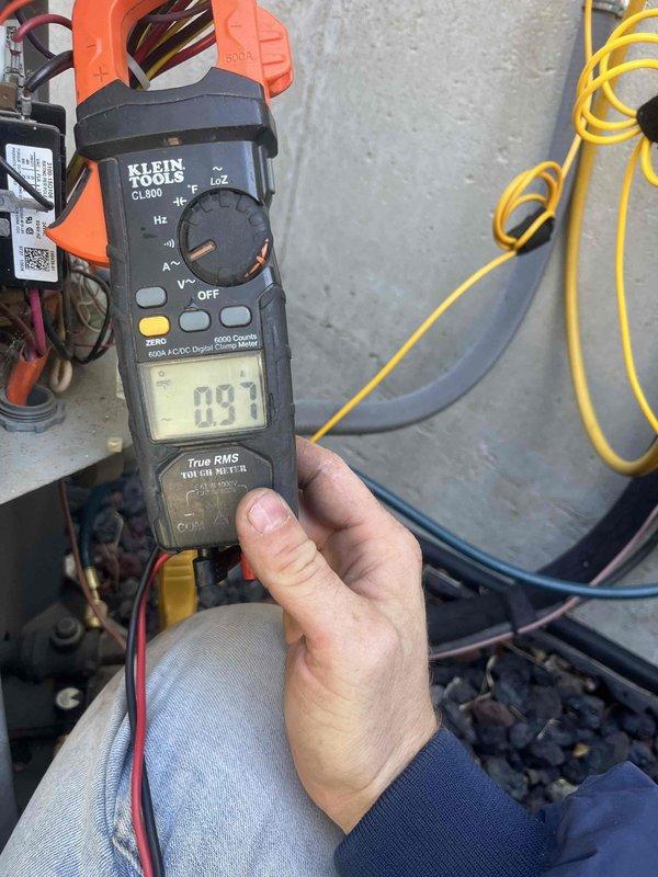 Completed preventative maintenance tune-up on two residential cooling systems (8 years and 18 years old) located at side of house. Performed comprehensive electrical diagnostics using digital clamp meter, measuring amperage draw on both units and verifying proper contactor operation. All systems tested and found operating within normal parameters.