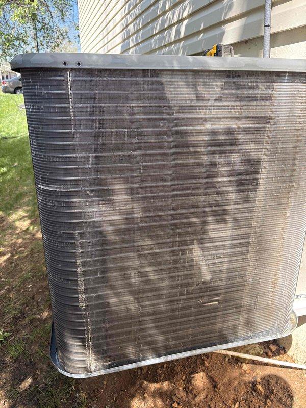 Completed comprehensive cooling maintenance on a 9-year-old air conditioning system. Performed standard tune-up procedures including inspection of indoor blower motor assembly, control board connections, and all electrical wiring. Verified proper operation of all internal components within the air handler cabinet. Inspected outdoor condenser unit and noted moderate accumulation of dirt and debris on aluminum fins, which may reduce efficiency if not addressed in future maintenance. All system components tested and confirmed operational at time of service completion.