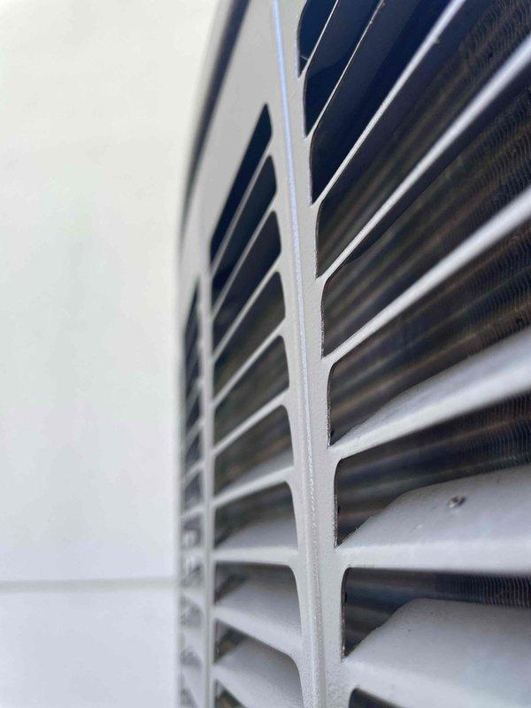 Completed comprehensive cooling system tune-up on 8-year-old ground-level outdoor unit. Performed full system inspection including control board diagnostics, electrical connections verification, condenser coil examination, and airflow assessment. All components found operating within normal parameters with no deficiencies noted; unit shows good maintenance history with clean coils and properly functioning controls.