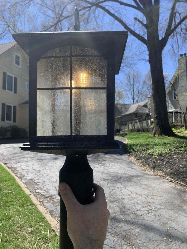 Completed breaker replacement and installed new photo eye sensor for exterior lighting system. Installed decorative outdoor lantern fixture with frosted glass panels and LED-compatible lamp, ensuring proper electrical connections and weatherproof mounting. All components tested and verified operational upon completion.