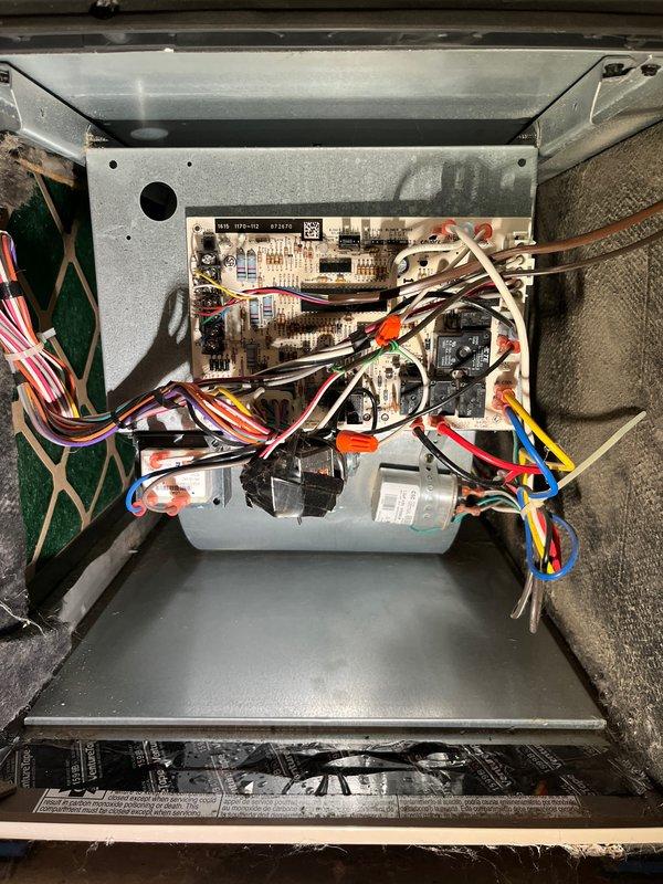 Completed comprehensive cooling system tune-up on single outdoor condensing unit and air handler. Performed standard maintenance protocol including inspection of electrical components, control board, contactors, and wiring connections within air handler compartment. Verified proper operation of condenser unit, checked refrigerant lines, and documented system condition with photos showing all components functioning within normal parameters.