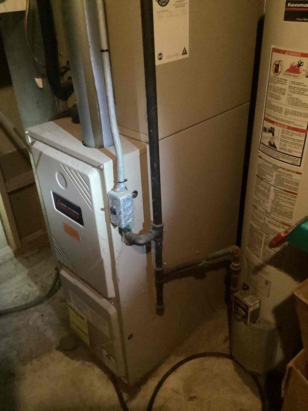 Responded to no heat call on 21-year-old furnace system with blower motor failure. Performed diagnostic assessment, identified faulty blower motor and capacitor preventing system operation. Replaced defective blower motor assembly and capacitor, restored furnace to full operational status, and verified proper airflow and heating functionality throughout the system.