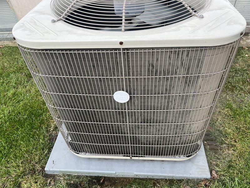 Completed comprehensive cooling season tune-up on single outdoor condensing unit. Performed standard maintenance protocol including inspection of condenser coils, which showed moderate accumulation of debris and dust requiring attention, verified fan operation and electrical connections, and documented unit condition with photographs. System operational upon completion with recommendations provided for ongoing maintenance.