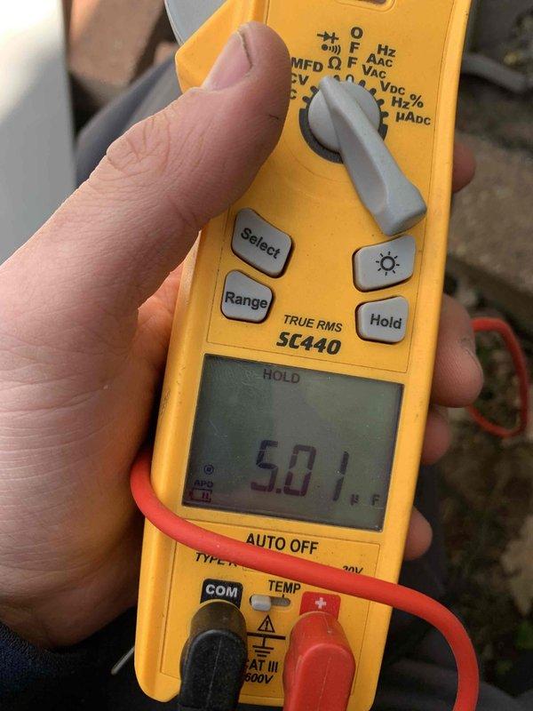 Completed cooling season tune-up on outdoor AC unit located at rear of property. Inspected and verified system operation, checked electrical amperage draw reading 5.01 amps, and evaluated air filter condition. All components operating within normal parameters at time of service.