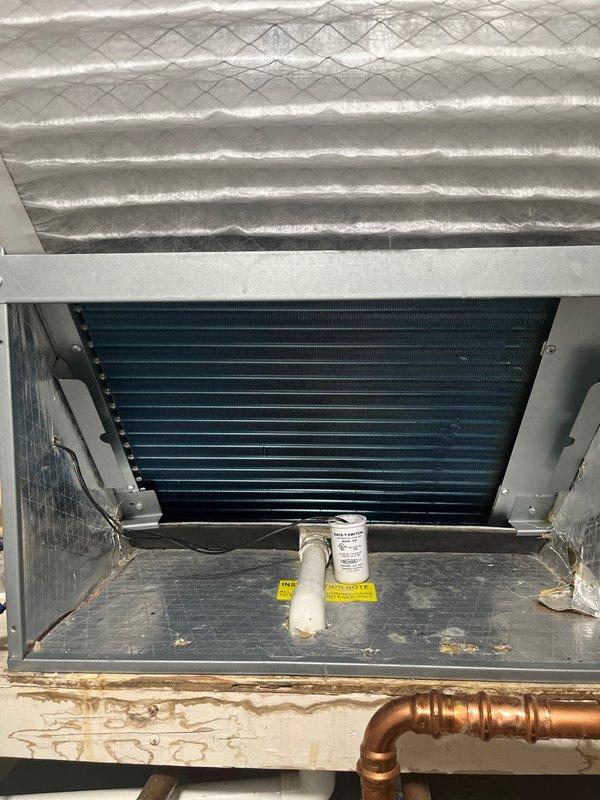 Replaced failed evaporator coil on rooftop HVAC unit. Removed old coil, installed new unit with proper refrigerant line connections, verified drain pan placement, and restored system to operational status. Unit tested and confirmed cooling function with temporary heat/cool capability maintained during repair.