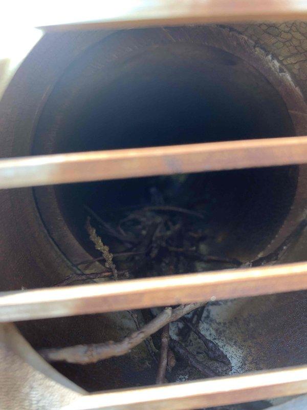 Responded to no heat call for furnace running continuously but blowing only cold air. Upon inspection of the 10+ year old basement unit, utilized camera inspection equipment to examine the heat exchanger and discovered significant deterioration and debris accumulation within the system. Found compromised heat exchanger with visible material breakdown and blockage affecting proper heat transfer and airflow. Documented findings with photographic evidence showing internal ductwork condition and heat exchanger damage. Advised on necessary repairs to restore heating function and ensure safe operation of the furnace system.