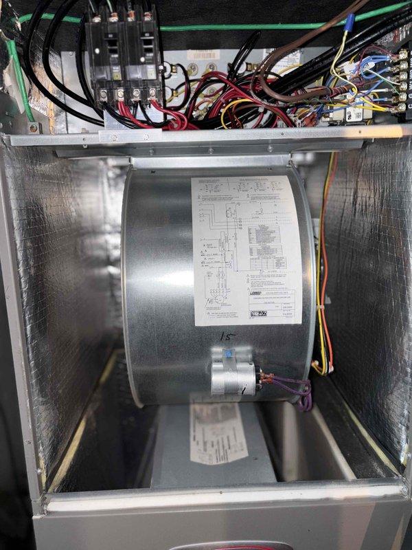 Completed cooling system tune-up on single AC unit located at side of home. Performed comprehensive inspection of blower motor assembly, verified proper electrical connections and wire management at junction box, and examined internal components within the air handler plenum. Replaced air filter with new pleated media filter to ensure optimal airflow and system efficiency.