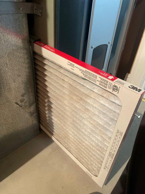 Completed comprehensive cooling tune-up service on two residential HVAC units located in side yard (one unit over one year old, one unit under one year old). Performed standard U10 maintenance protocol on both systems, including inspection of air handlers, verification of refrigerant levels, electrical connections check, and condenser coil assessment. Inspected and documented air filtration systems on both units, noting pleated filters with cardboard frames installed in furnace/air handler compartments. Both systems operating within normal parameters upon completion of tune-up service.