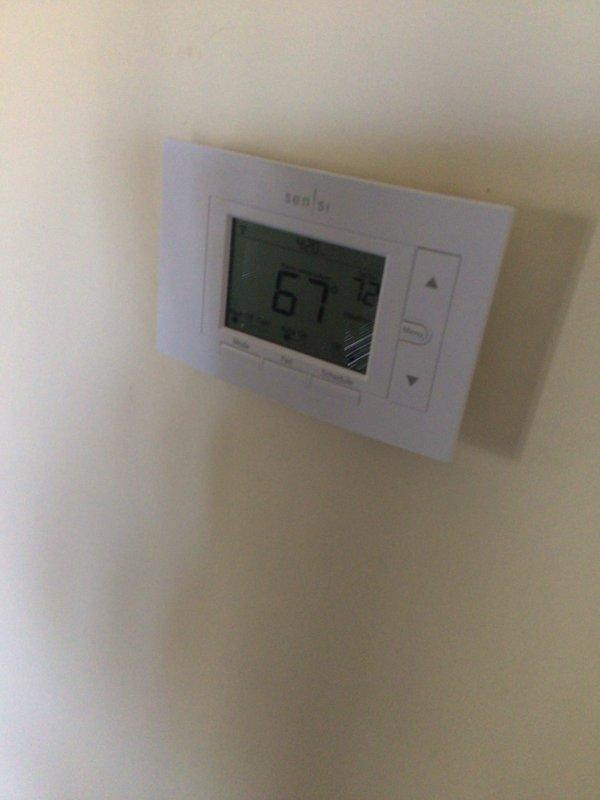 Responded to a no heat call for two HVAC units located in the basement, both under 10 years old. Upon inspection, found the return air filter severely clogged with dust and debris, restricting airflow to the system. Replaced the heavily soiled filter and verified proper system operation. Thermostat was functioning correctly and displaying accurate temperature readings. System restored to normal heating operation with improved airflow.