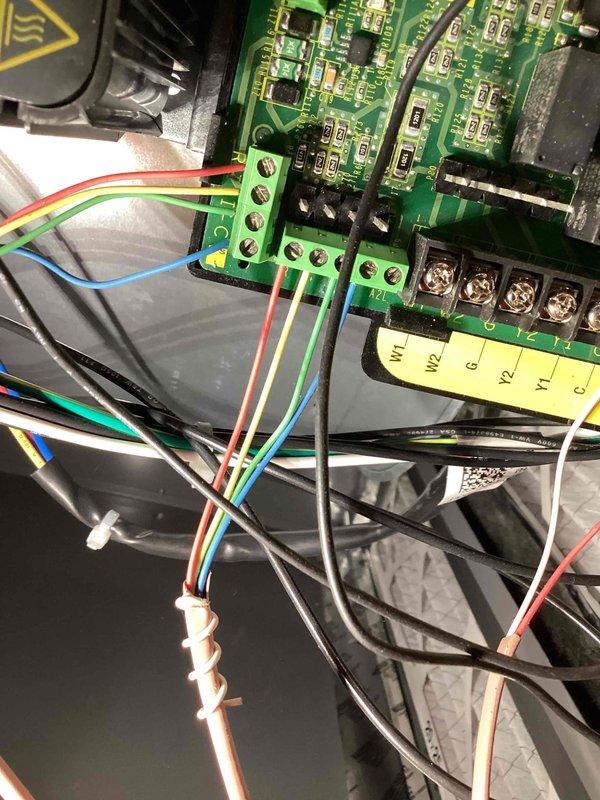 Responded to service call for furnace overheating issue on unit less than one year old located in basement. Upon inspection, found smart thermostat was set to cooling mode and calling for 68°F while system was displaying 80°F inside temperature. Verified all wiring connections at control board were secure and properly terminated. Reviewed thermostat programming and system settings with homeowner to ensure proper operation of new installation.